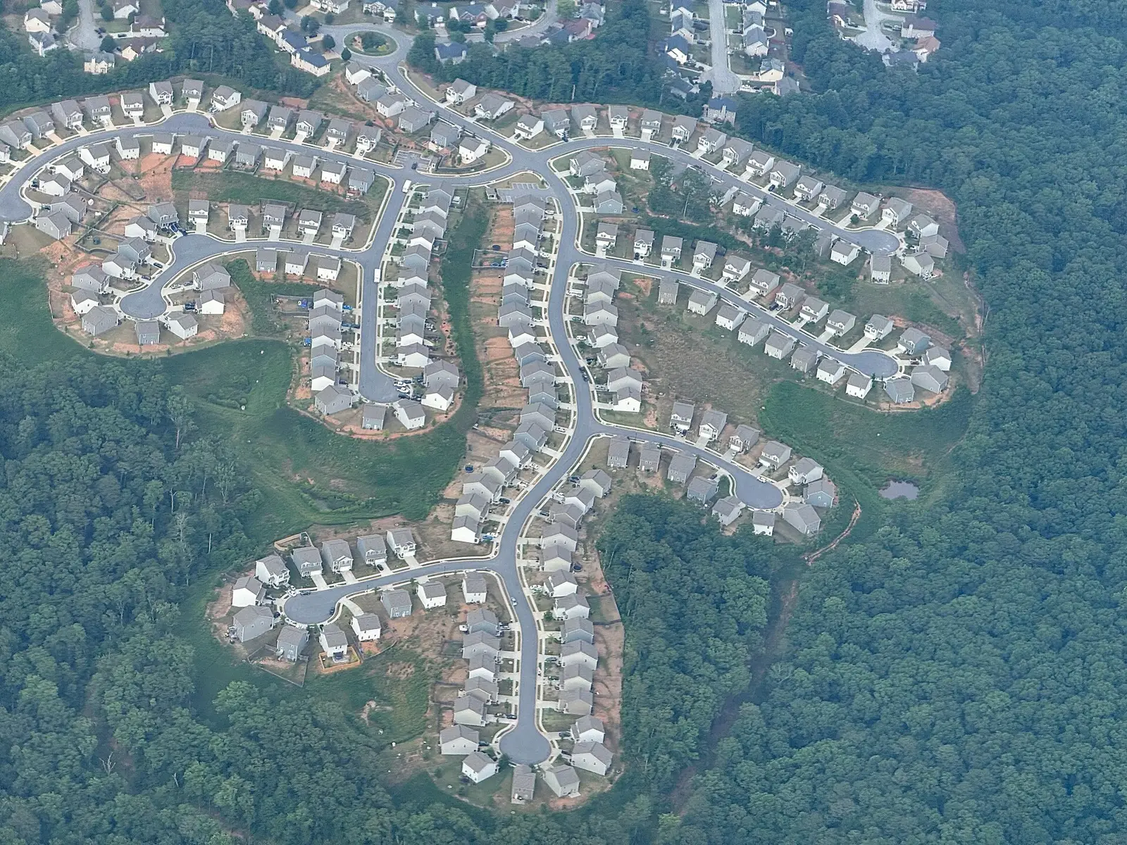 Aerial view of a wooded suburban community in metro Atlanta
