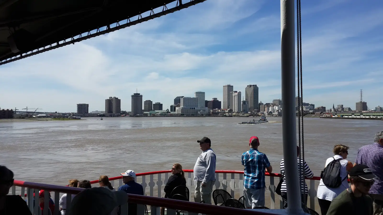 The New Orleans skyline rising above the Mississippi River, viewed from the deck of the Steamboat Natchez, Louisiana