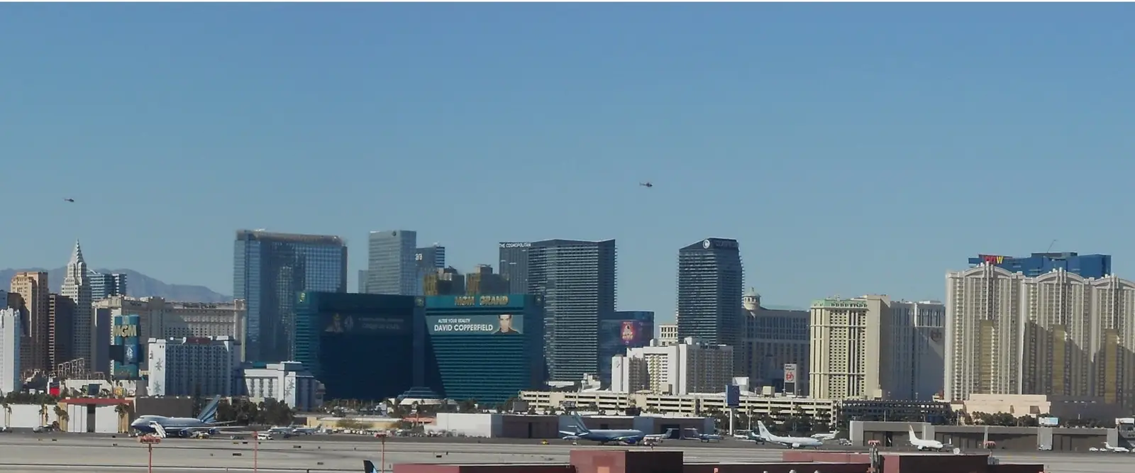 The Las Vegas Strip skyline with the Luxor pyramid and resort towers under a clear sky, Nevada