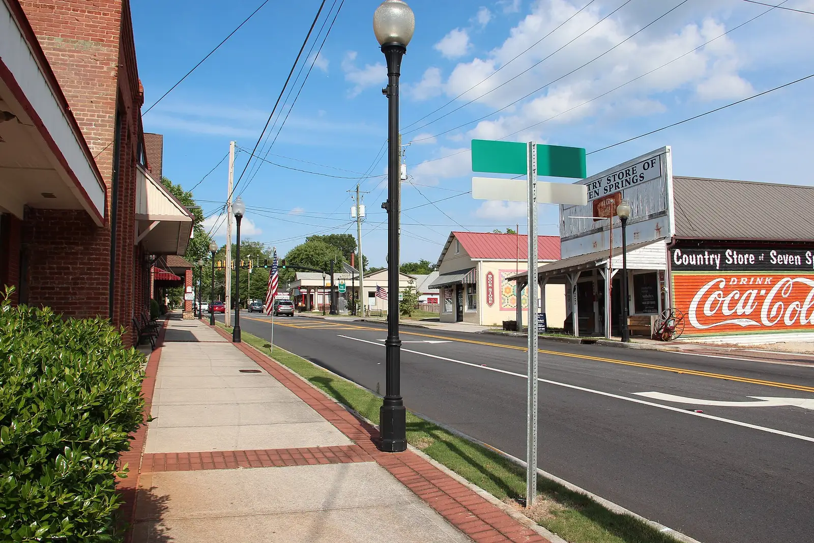 Storefronts along Marietta Street in downtown Powder Springs, Georgia, on a clear day